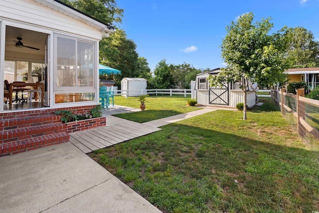 1145 Forest Dr, North Myrtle Beach, SC 29582 - fenced backyard with a storage shed and a sunroom