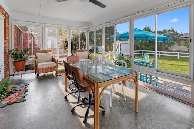 1145 Forest Dr, North Myrtle Beach, SC 29582 - sunroom / solarium featuring a ceiling fan and outdoor dining space