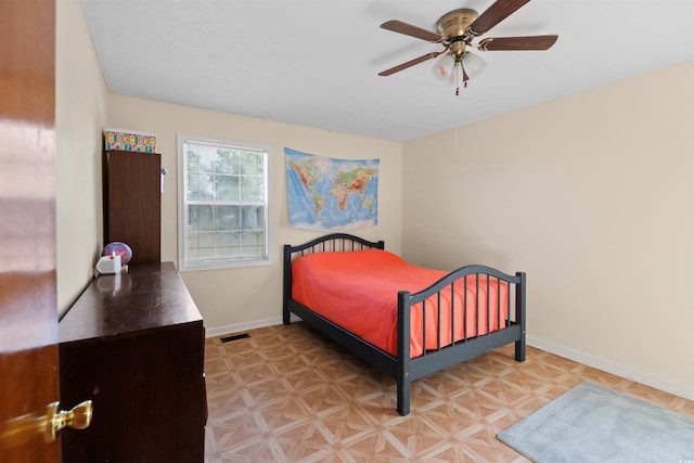 1145 Forest Dr, North Myrtle Beach, SC 29582 - bedroom with baseboards and ceiling fan