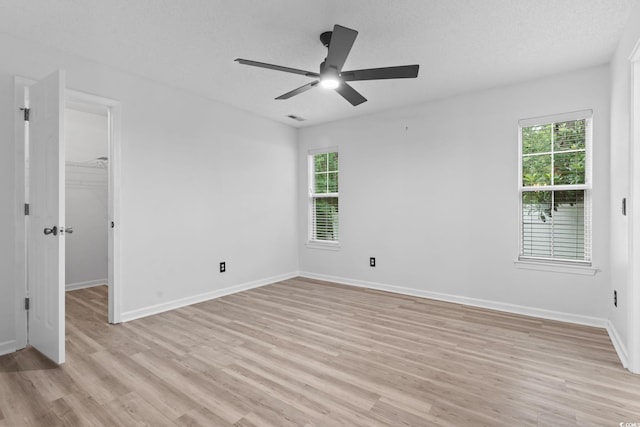 1331 Bermuda Ct, Surfside Beach, SC 29575 - spare room featuring light wood finished floors, ceiling fan, and healthy amount of natural light