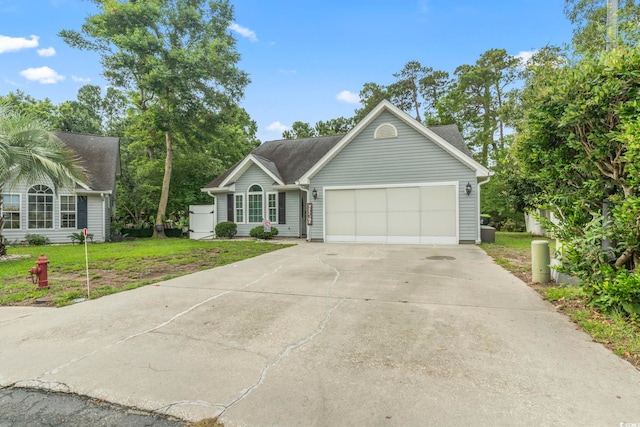 1331 Bermuda Ct, Surfside Beach, SC 29575 - ranch-style house with an attached garage, concrete driveway, and a front yard
