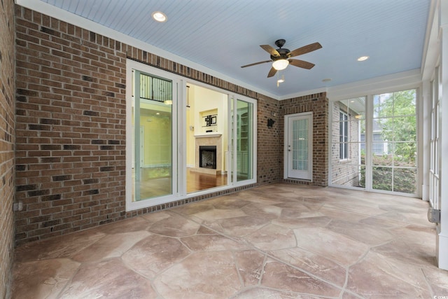 28 Grey Moss Rd, Murrells Inlet, SC 29576 - unfurnished sunroom featuring a ceiling fan
