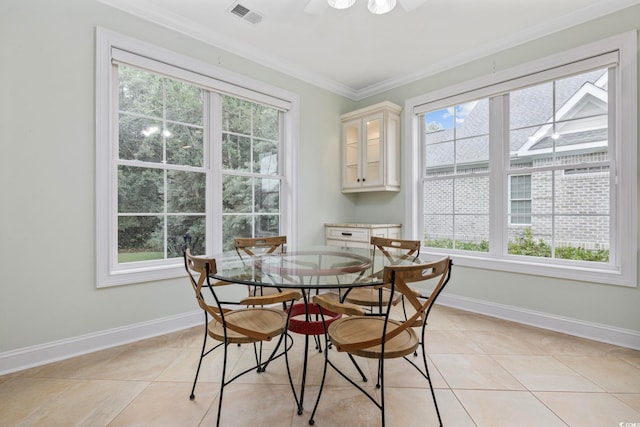 28 Grey Moss Rd, Murrells Inlet, SC 29576 - dining area with crown molding and light tile patterned floors