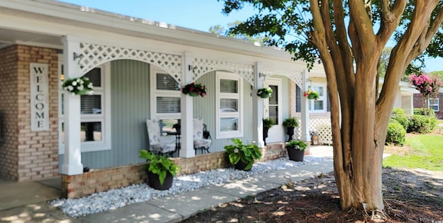 610 Hibiscus Ave Unit 610, Myrtle Beach, SC 29572 - view of exterior entry with covered porch and brick siding