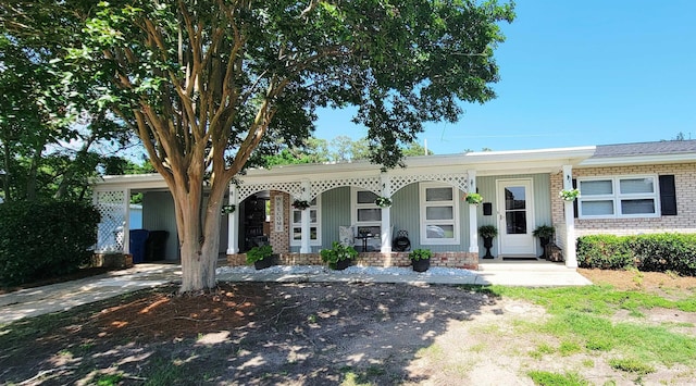 610 Hibiscus Ave Unit 610, Myrtle Beach, SC 29572 - single story home featuring a porch and brick siding