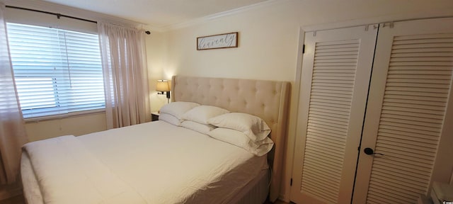 610 Hibiscus Ave Unit 610, Myrtle Beach, SC 29572 - bedroom featuring crown molding and a closet