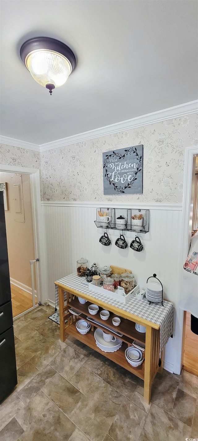610 Hibiscus Ave Unit 610, Myrtle Beach, SC 29572 - detailed view of a wainscoted wall, crown molding, and wallpapered walls