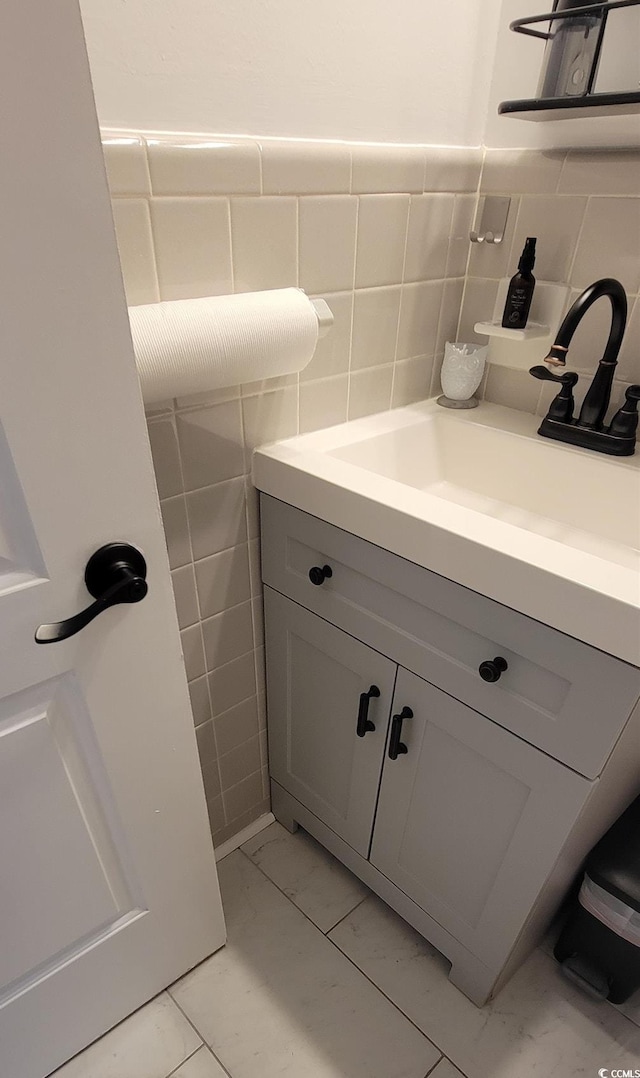 610 Hibiscus Ave Unit 610, Myrtle Beach, SC 29572 - bathroom with vanity, marble finish flooring, and tile walls