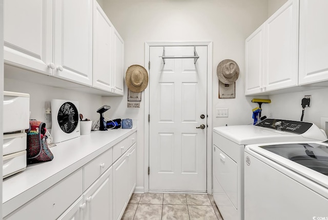 1208 Trisail Ln, North Myrtle Beach, SC 29582 - washroom featuring cabinet space, washing machine and dryer, and light tile patterned floors