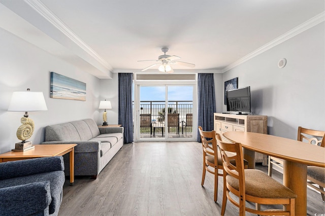 2201 S Ocean Blvd Unit 103, Myrtle Beach, SC 29577 - living area with crown molding, ceiling fan, and light wood-type flooring