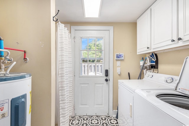 1416 Edge Dr, North Myrtle Beach, SC 29582 - laundry area featuring water heater, cabinet space, and washer and clothes dryer