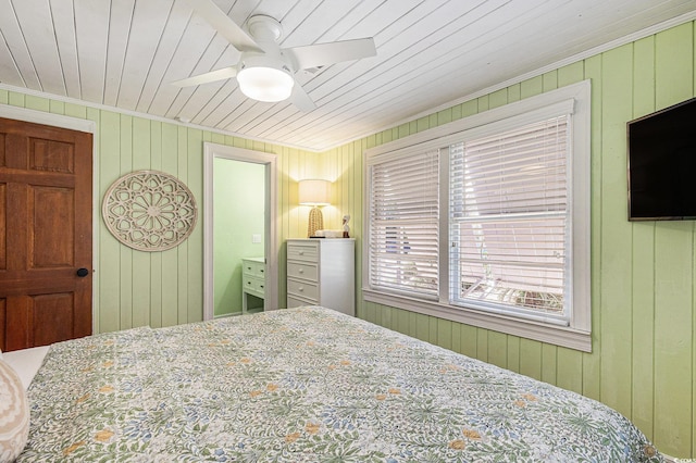 1416 Edge Dr, North Myrtle Beach, SC 29582 - bedroom with wood walls, ornamental molding, and a ceiling fan