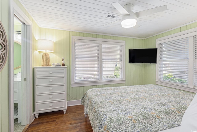 1416 Edge Dr, North Myrtle Beach, SC 29582 - bedroom with wood finished floors, wooden walls, a ceiling fan, and ornamental molding