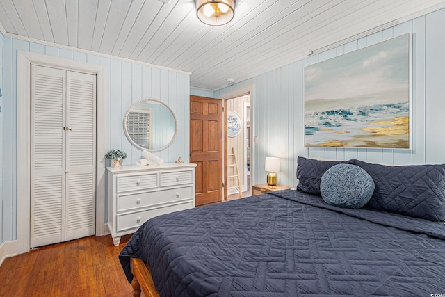1416 Edge Dr, North Myrtle Beach, SC 29582 - bedroom featuring ornamental molding, wood finished floors, and wooden walls