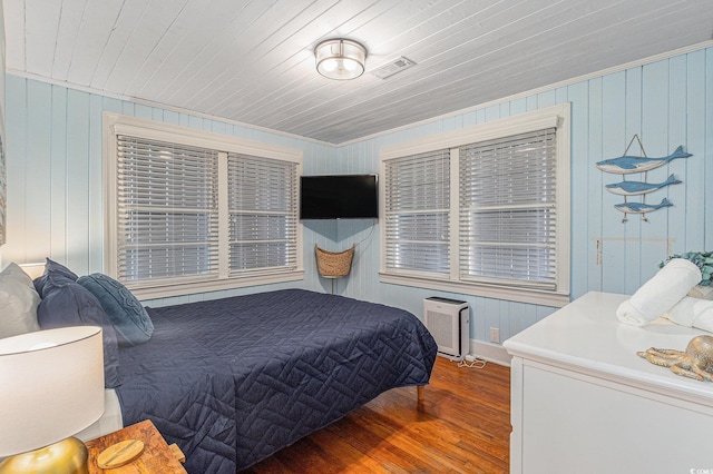 1416 Edge Dr, North Myrtle Beach, SC 29582 - bedroom featuring wood finished floors and wooden walls