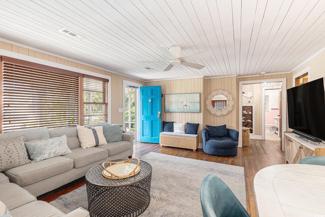 1416 Edge Dr, North Myrtle Beach, SC 29582 - living area with wooden ceiling, ornamental molding, wooden walls, a ceiling fan, and wood finished floors