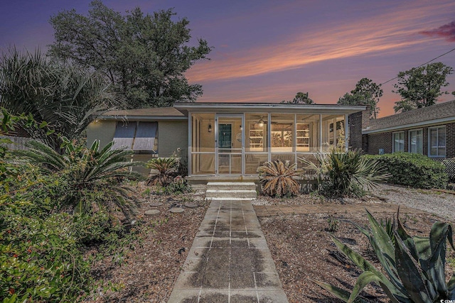 1416 Edge Dr, North Myrtle Beach, SC 29582 - view of front of property featuring a sunroom