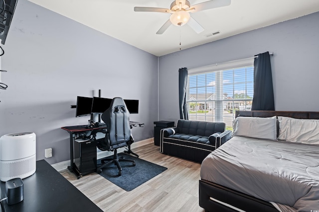 2885 Desert Rose St, Little River, SC 29566 - bedroom featuring light wood finished floors, an office area, and ceiling fan