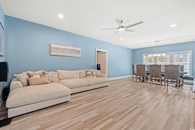 2885 Desert Rose St, Little River, SC 29566 - living area with light wood-type flooring, a ceiling fan, and recessed lighting