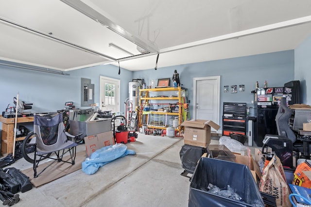 2885 Desert Rose St, Little River, SC 29566 - garage featuring electric panel, electric water heater, and a workshop area