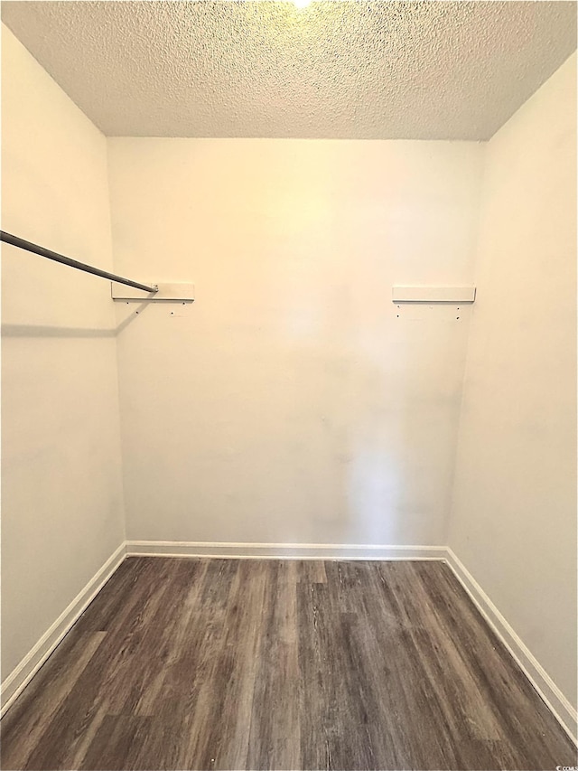 1025 Carolina Rd Unit H4, Conway, SC 29526 - walk in closet with dark wood-type flooring