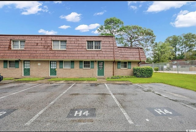 1025 Carolina Rd Unit H4, Conway, SC 29526 - multi unit property with brick siding, uncovered parking, and mansard roof