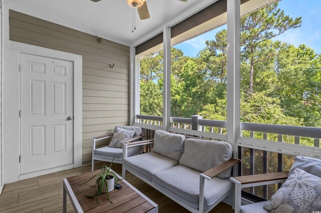 6015 Catalina Dr Unit 932, North Myrtle Beach, SC 29582 - sunroom with a ceiling fan and an outdoor hangout area