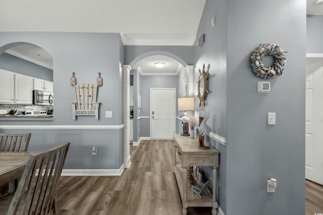 6015 Catalina Dr Unit 932, North Myrtle Beach, SC 29582 - hall with arched walkways, crown molding, and wood finished floors