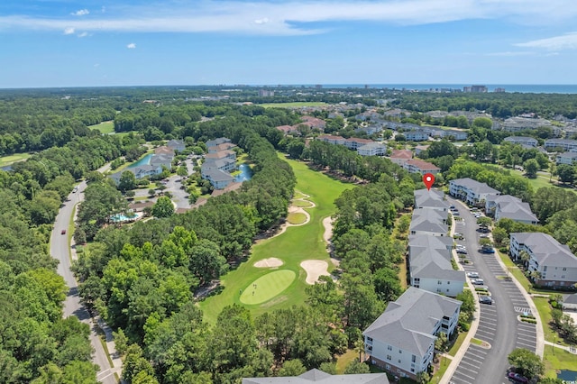 6015 Catalina Dr Unit 932, North Myrtle Beach, SC 29582 - aerial view of residential area with a local golf course and a tree filled landscape