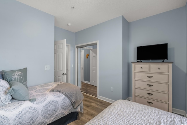 6015 Catalina Dr Unit 932, North Myrtle Beach, SC 29582 - bedroom featuring wood finished floors and a closet