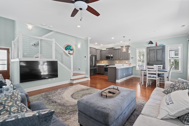 5 Ruth St, Murrells Inlet, SC 29576 - living room featuring ceiling fan, dark wood finished floors, crown molding, and recessed lighting