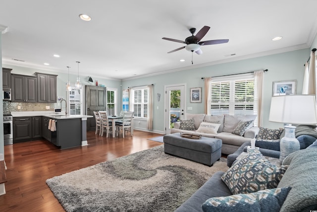 5 Ruth St, Murrells Inlet, SC 29576 - living area with healthy amount of natural light, dark wood-style floors, ceiling fan, recessed lighting, and crown molding