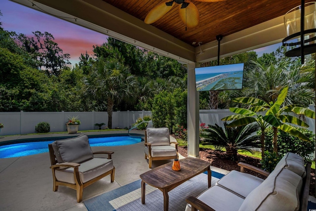 5 Ruth St, Murrells Inlet, SC 29576 - fenced backyard with ceiling fan and a patio