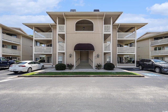 4290 Pinehurst Cir Unit B3, Little River, SC 29566 - view of apartment building / complex with uncovered parking