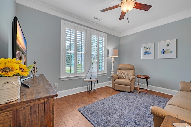 700 Shell Point Ct, Longs, SC 29568 - living area with crown molding, a ceiling fan, and wood finished floors