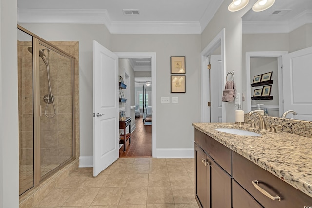 700 Shell Point Ct, Longs, SC 29568 - full bathroom with vanity, a stall shower, ensuite bathroom, crown molding, and tile patterned floors