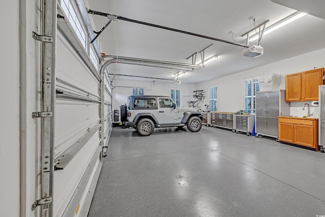 700 Shell Point Ct, Longs, SC 29568 - garage with a garage door opener and a sink