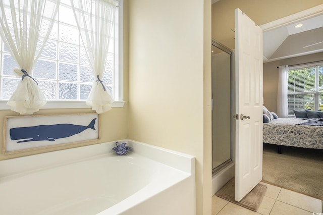 388 Sea Turtle Dr, Myrtle Beach, SC 29588 - ensuite bathroom with a garden tub, a shower stall, tile patterned floors, and vaulted ceiling