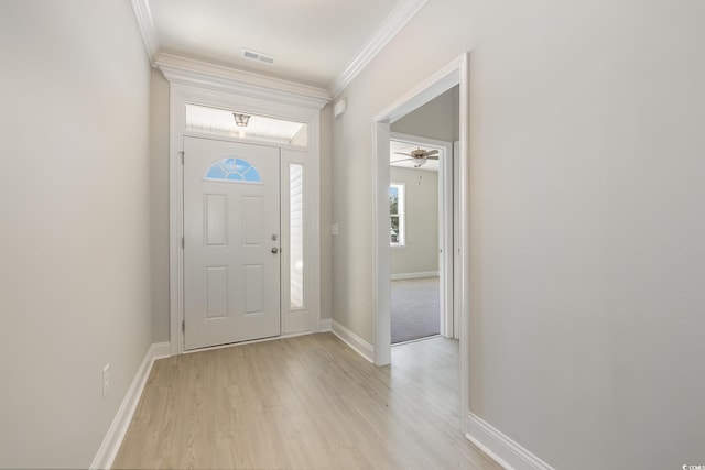 369 Log Cabin Rd, Loris, SC 29569 - entryway featuring crown molding, light wood-style flooring, and ceiling fan