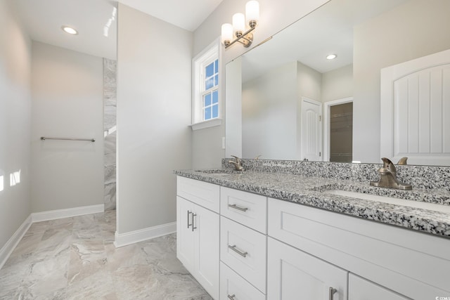 369 Log Cabin Rd, Loris, SC 29569 - full bath with double vanity, marble finish flooring, and recessed lighting