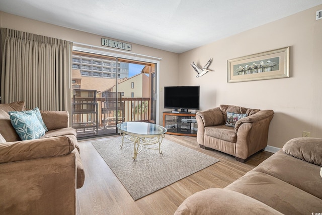 5505 N Ocean Blvd Unit 303, Myrtle Beach, SC 29577 - living area with wood finished floors