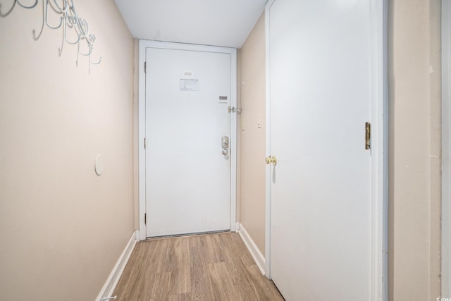 5505 N Ocean Blvd Unit 303, Myrtle Beach, SC 29577 - doorway with light wood finished floors and baseboards