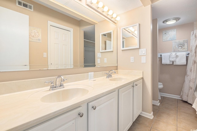5505 N Ocean Blvd Unit 303, Myrtle Beach, SC 29577 - full bathroom featuring tile patterned floors and double vanity