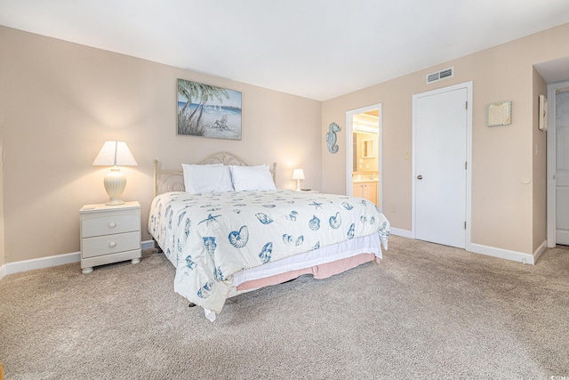 5505 N Ocean Blvd Unit 303, Myrtle Beach, SC 29577 - carpeted bedroom with baseboards and connected bathroom