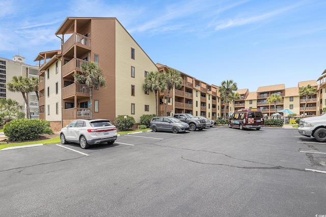 5505 N Ocean Blvd Unit 303, Myrtle Beach, SC 29577 - view of apartment building / complex with uncovered parking