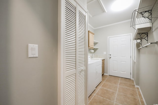 628 Lake Estates Ct, Conway, SC 29526 - washroom featuring cabinet space, ornamental molding, light tile patterned flooring, washer / clothes dryer, and attic access