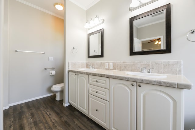 628 Lake Estates Ct, Conway, SC 29526 - full bath with ornamental molding, double vanity, wood finished floors, and a ceiling fan