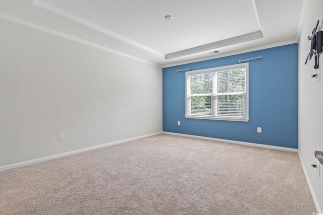 597 Heritage Downs Dr, Conway, SC 29526 - carpeted spare room featuring a tray ceiling and ornamental molding