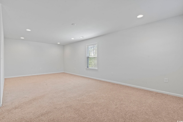 597 Heritage Downs Dr, Conway, SC 29526 - spare room featuring recessed lighting and light carpet