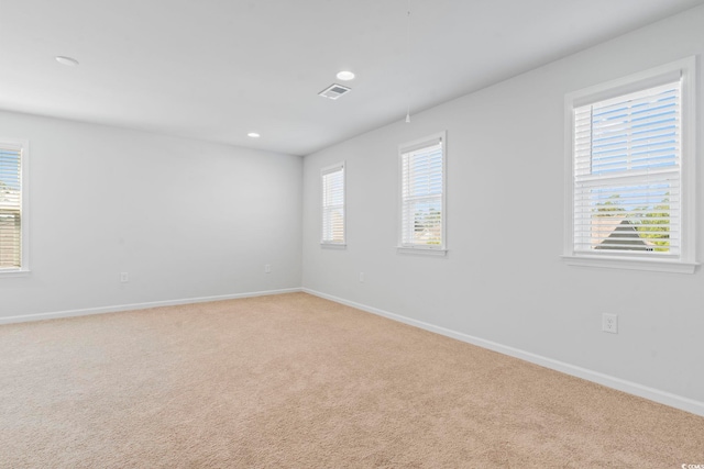 597 Heritage Downs Dr, Conway, SC 29526 - empty room featuring light carpet and recessed lighting